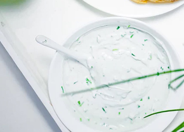 A bowl  of dill infused creamcheese